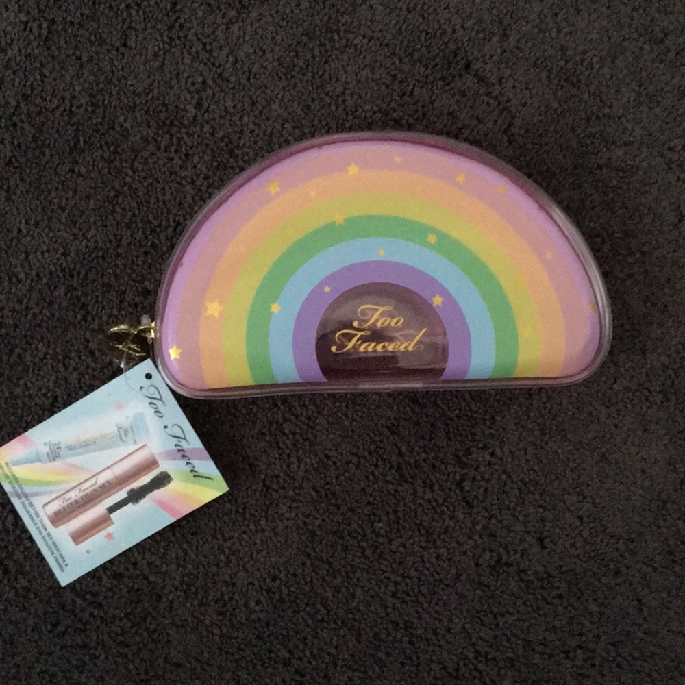 Exclusive rainbow Too Faced makeup bag